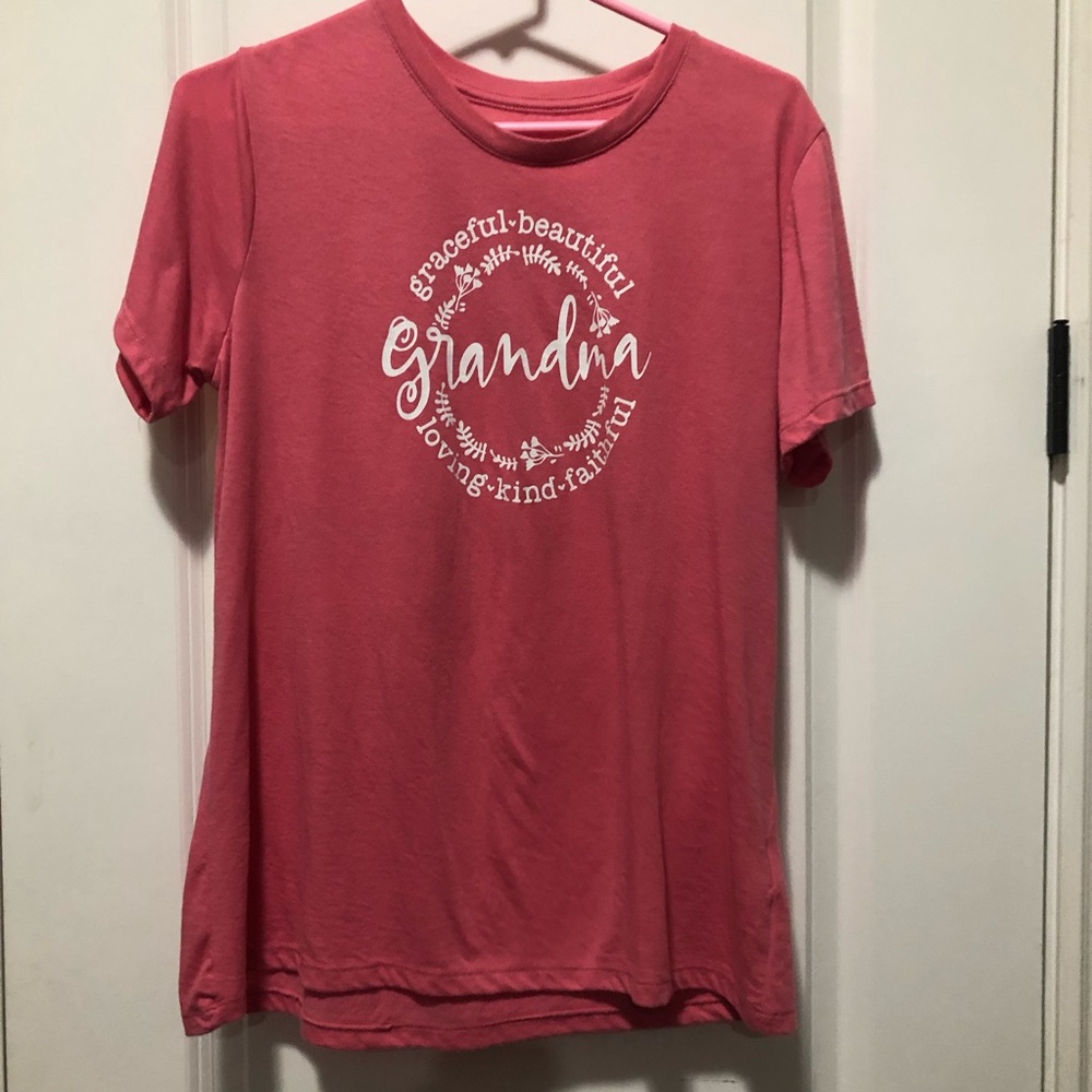 Woman’s Size L tee shirt. Mauve/pink pit to pit 20-22
